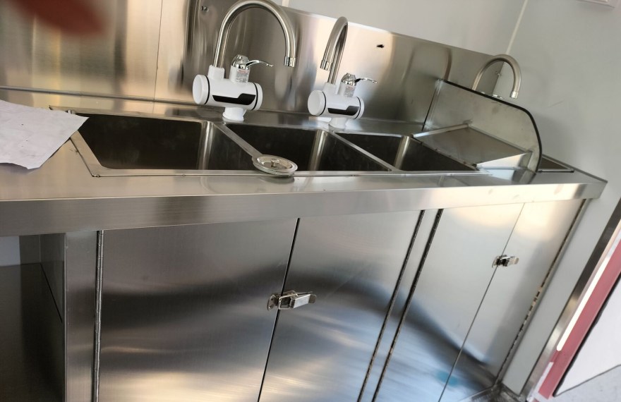 small shipping container food trailer with 3 compartment water sink